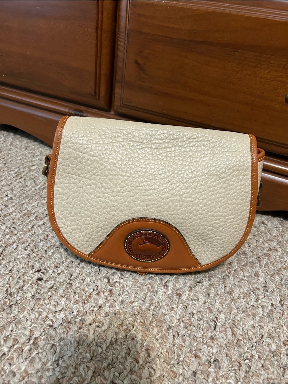 Dooney & Bourke Cream and Tan Pebbled Leather Crossbody
